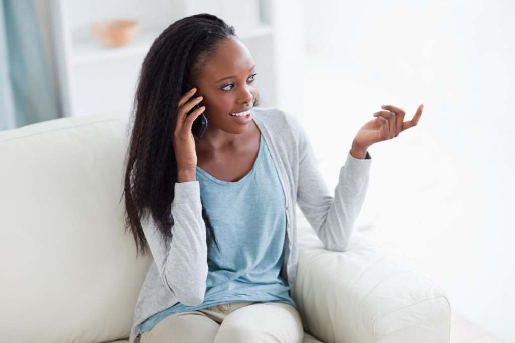 Top Tips for Surviving the Graveyard Shift young woman talking on cell phone