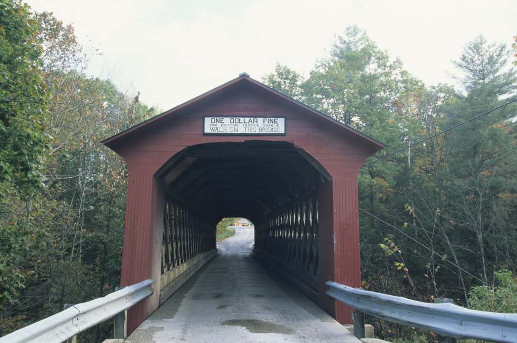 The Chiselville Covered Bridge, located in Sunderland, Vermont. The bridge, built in 1870 by Daniel Oatman, spans the Roaring Branch Brook. 