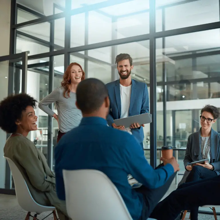 Healthcare staffing professionals collaborating during a team meeting in a modern office.